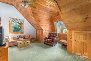 NO DAMAGE FROM HELENE-HIGH  DRY. This warm and inviting log home on Waynesville Country Club Inn in North Carolina - for sale on GolfHomes.com, golf home, golf lot