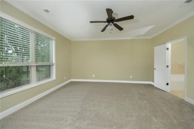 THIS SPACIOUS FOUR-BEDROOM HOME OFFERS OVER 2,700 SQUARE FEET OF on Laurel Island Links in Georgia - for sale on GolfHomes.com, golf home, golf lot