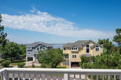 An extensive and pricey exterior transformation on this on The Currituck Golf Club in North Carolina - for sale on GolfHomes.com, golf home, golf lot