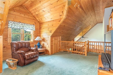 NO DAMAGE FROM HELENE-HIGH  DRY. This warm and inviting log home on Waynesville Country Club Inn in North Carolina - for sale on GolfHomes.com, golf home, golf lot