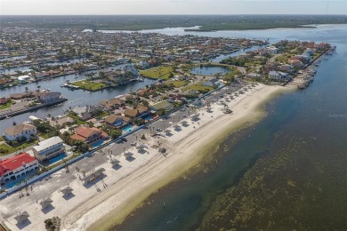 This is the one you've been waiting for -- 66 feet of waterfront on Gulf Harbors Golf Course in Florida - for sale on GolfHomes.com, golf home, golf lot