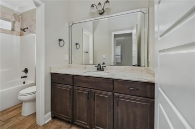 THIS SPACIOUS FOUR-BEDROOM HOME OFFERS OVER 2,700 SQUARE FEET OF on Laurel Island Links in Georgia - for sale on GolfHomes.com, golf home, golf lot