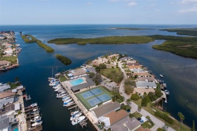 This is the one you've been waiting for -- 66 feet of waterfront on Gulf Harbors Golf Course in Florida - for sale on GolfHomes.com, golf home, golf lot