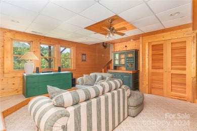 NO DAMAGE FROM HELENE-HIGH  DRY. This warm and inviting log home on Waynesville Country Club Inn in North Carolina - for sale on GolfHomes.com, golf home, golf lot