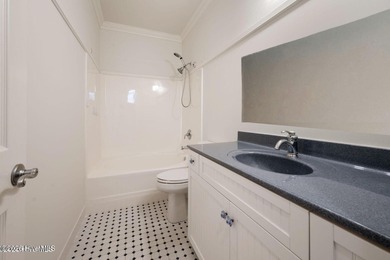 Welcome to your beautiful brick home overlooking a peaceful pond on Cape Fear National At Brunswick Forest in North Carolina - for sale on GolfHomes.com, golf home, golf lot