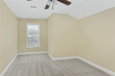THIS SPACIOUS FOUR-BEDROOM HOME OFFERS OVER 2,700 SQUARE FEET OF on Laurel Island Links in Georgia - for sale on GolfHomes.com, golf home, golf lot