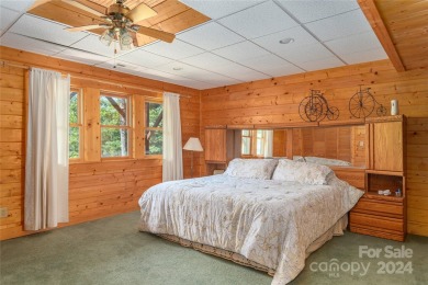 NO DAMAGE FROM HELENE-HIGH  DRY. This warm and inviting log home on Waynesville Country Club Inn in North Carolina - for sale on GolfHomes.com, golf home, golf lot