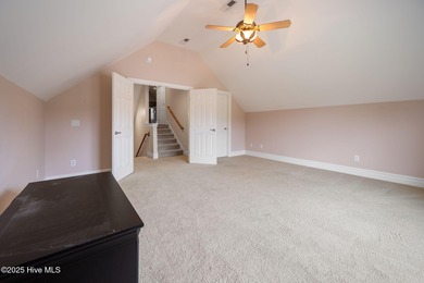 Welcome to your beautiful brick home overlooking a peaceful pond on Cape Fear National At Brunswick Forest in North Carolina - for sale on GolfHomes.com, golf home, golf lot