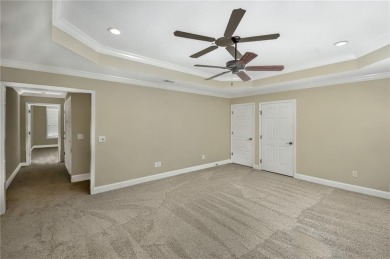 THIS SPACIOUS FOUR-BEDROOM HOME OFFERS OVER 2,700 SQUARE FEET OF on Laurel Island Links in Georgia - for sale on GolfHomes.com, golf home, golf lot
