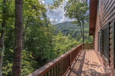 NO DAMAGE FROM HELENE-HIGH  DRY. This warm and inviting log home on Waynesville Country Club Inn in North Carolina - for sale on GolfHomes.com, golf home, golf lot