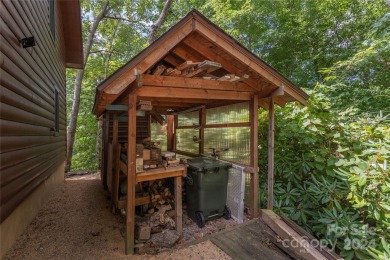 NO DAMAGE FROM HELENE-HIGH  DRY. This warm and inviting log home on Waynesville Country Club Inn in North Carolina - for sale on GolfHomes.com, golf home, golf lot