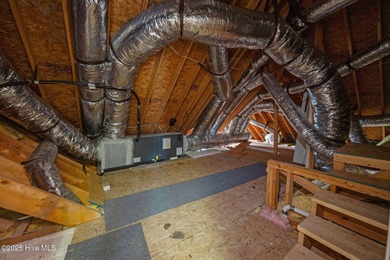 Welcome to your beautiful brick home overlooking a peaceful pond on Cape Fear National At Brunswick Forest in North Carolina - for sale on GolfHomes.com, golf home, golf lot