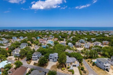 An extensive and pricey exterior transformation on this on The Currituck Golf Club in North Carolina - for sale on GolfHomes.com, golf home, golf lot