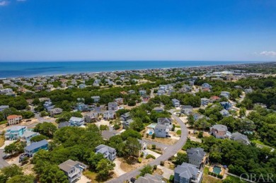 An extensive and pricey exterior transformation on this on The Currituck Golf Club in North Carolina - for sale on GolfHomes.com, golf home, golf lot