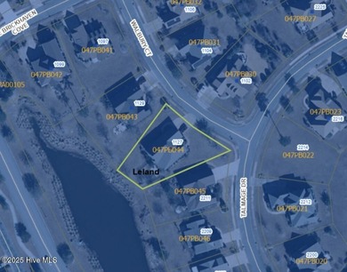 Welcome to your beautiful brick home overlooking a peaceful pond on Cape Fear National At Brunswick Forest in North Carolina - for sale on GolfHomes.com, golf home, golf lot