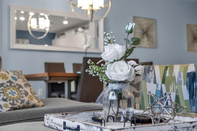 Welcome to a beautifully maintained, MOVE-IN READY townhome in on The Oasis Club at Champions Gate in Florida - for sale on GolfHomes.com, golf home, golf lot