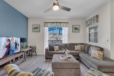 Welcome to a beautifully maintained, MOVE-IN READY townhome in on The Oasis Club at Champions Gate in Florida - for sale on GolfHomes.com, golf home, golf lot