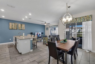 Welcome to a beautifully maintained, MOVE-IN READY townhome in on The Oasis Club at Champions Gate in Florida - for sale on GolfHomes.com, golf home, golf lot