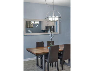 Welcome to a beautifully maintained, MOVE-IN READY townhome in on The Oasis Club at Champions Gate in Florida - for sale on GolfHomes.com, golf home, golf lot