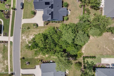 Located in the sought-after Timber Ridge section of Compass on Compass Pointe Golf Course in North Carolina - for sale on GolfHomes.com, golf home, golf lot