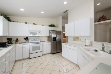Wow!! Look at the panoramic views of the lake and 9th hole from on Estero Country Club in Florida - for sale on GolfHomes.com, golf home, golf lot