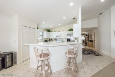 Wow!! Look at the panoramic views of the lake and 9th hole from on Estero Country Club in Florida - for sale on GolfHomes.com, golf home, golf lot