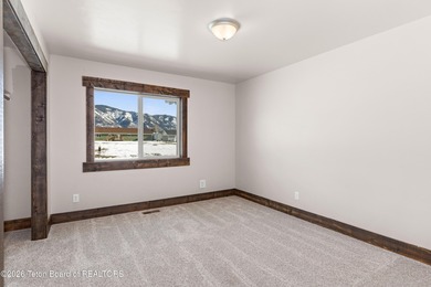 This well-cared for, remodeled home in Star Valley Ranch is on Star Valley RV Golf Course in Wyoming - for sale on GolfHomes.com, golf home, golf lot