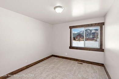 This well-cared for, remodeled home in Star Valley Ranch is on Star Valley RV Golf Course in Wyoming - for sale on GolfHomes.com, golf home, golf lot