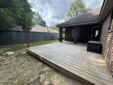 Don't miss out on this perfect home next to the serene Twin on Diamondhead Country Club in Mississippi - for sale on GolfHomes.com, golf home, golf lot