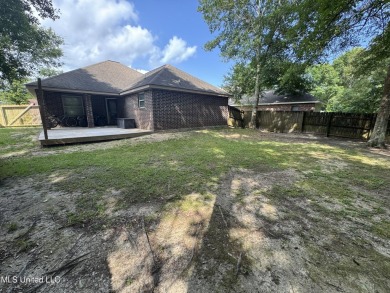 Don't miss out on this perfect home next to the serene Twin on Diamondhead Country Club in Mississippi - for sale on GolfHomes.com, golf home, golf lot