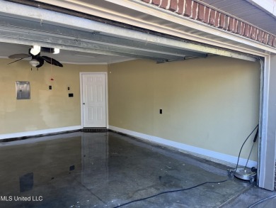 Don't miss out on this perfect home next to the serene Twin on Diamondhead Country Club in Mississippi - for sale on GolfHomes.com, golf home, golf lot