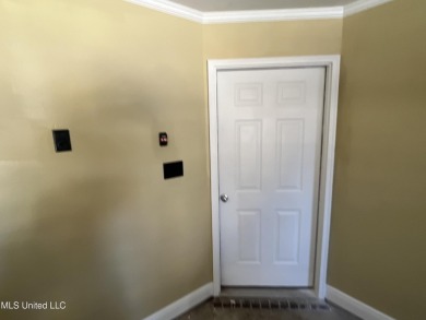 Don't miss out on this perfect home next to the serene Twin on Diamondhead Country Club in Mississippi - for sale on GolfHomes.com, golf home, golf lot