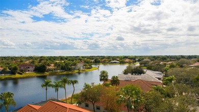 Discover this stunning one-story estate in Weston Hills on Weston Hills Country Club in Florida - for sale on GolfHomes.com, golf home, golf lot
