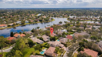 Discover this stunning one-story estate in Weston Hills on Weston Hills Country Club in Florida - for sale on GolfHomes.com, golf home, golf lot