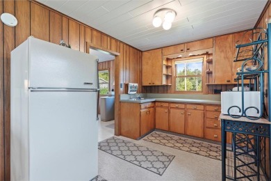 Experience Pelican Lake life at this furnished 2-bedroom on Deacons Lodge Golf Course in Minnesota - for sale on GolfHomes.com, golf home, golf lot