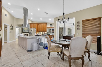 Experience luxury living at 12451 Gateway Greens Dr in Fort on Gateway Golf and Country Club in Florida - for sale on GolfHomes.com, golf home, golf lot