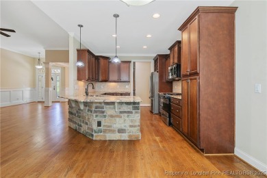 One of a kind custom, ranch-style home with courtyard entry and on Anderson Creek Golf Club in North Carolina - for sale on GolfHomes.com, golf home, golf lot