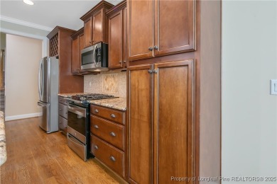One of a kind custom, ranch-style home with courtyard entry and on Anderson Creek Golf Club in North Carolina - for sale on GolfHomes.com, golf home, golf lot