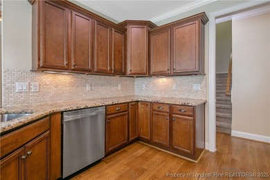 One of a kind custom, ranch-style home with courtyard entry and on Anderson Creek Golf Club in North Carolina - for sale on GolfHomes.com, golf home, golf lot