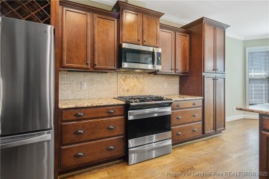 One of a kind custom, ranch-style home with courtyard entry and on Anderson Creek Golf Club in North Carolina - for sale on GolfHomes.com, golf home, golf lot