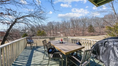 Discover this charming 2-bed/bath home in the scenic golf cart on The Oaks Golf Course in Missouri - for sale on GolfHomes.com, golf home, golf lot