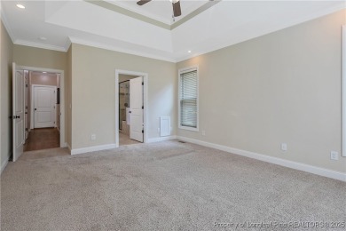 One of a kind custom, ranch-style home with courtyard entry and on Anderson Creek Golf Club in North Carolina - for sale on GolfHomes.com, golf home, golf lot