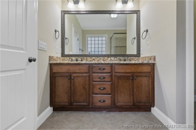 One of a kind custom, ranch-style home with courtyard entry and on Anderson Creek Golf Club in North Carolina - for sale on GolfHomes.com, golf home, golf lot