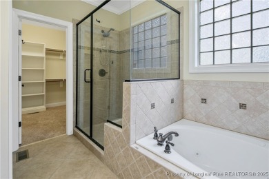 One of a kind custom, ranch-style home with courtyard entry and on Anderson Creek Golf Club in North Carolina - for sale on GolfHomes.com, golf home, golf lot