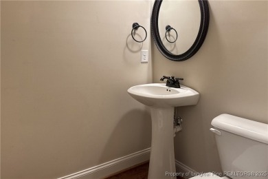One of a kind custom, ranch-style home with courtyard entry and on Anderson Creek Golf Club in North Carolina - for sale on GolfHomes.com, golf home, golf lot