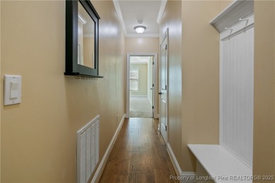 One of a kind custom, ranch-style home with courtyard entry and on Anderson Creek Golf Club in North Carolina - for sale on GolfHomes.com, golf home, golf lot