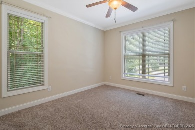 One of a kind custom, ranch-style home with courtyard entry and on Anderson Creek Golf Club in North Carolina - for sale on GolfHomes.com, golf home, golf lot
