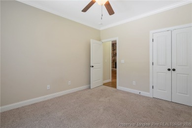 One of a kind custom, ranch-style home with courtyard entry and on Anderson Creek Golf Club in North Carolina - for sale on GolfHomes.com, golf home, golf lot