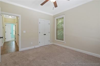 One of a kind custom, ranch-style home with courtyard entry and on Anderson Creek Golf Club in North Carolina - for sale on GolfHomes.com, golf home, golf lot