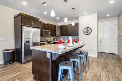 This stunning home is located in the highly sought-after on Entrada at Snow Canyon in Utah - for sale on GolfHomes.com, golf home, golf lot